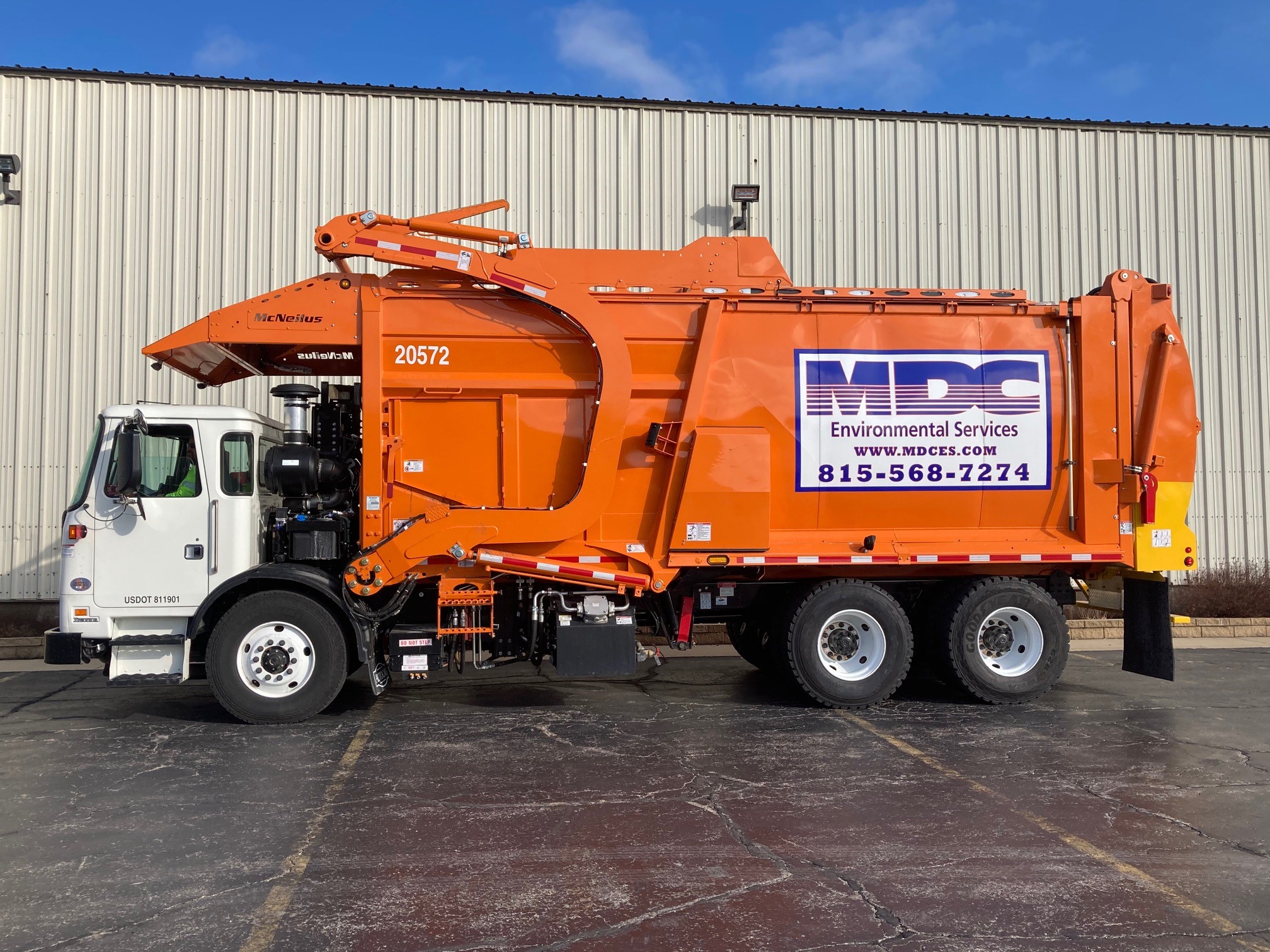 MDC Environmental Services truck on the way to pickups across McHenry and Kane Counties