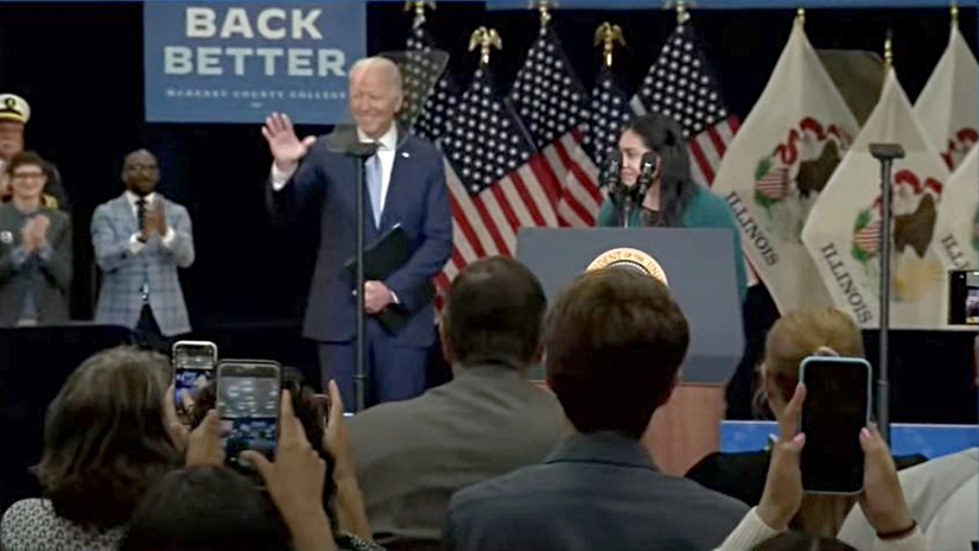 President Joe Biden greets attendees at MCC alongside MCC student trustee Edith Sanchez