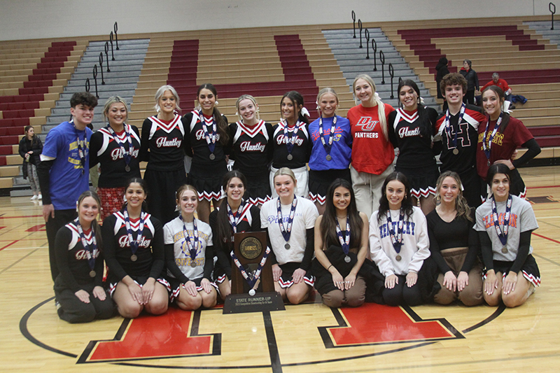 The Huntley High School co-ed cheerleading squad took home IHSA State Competitive Cheering Large Co-ed Division runners-up honors. The squad showed off its runners-up trophy.