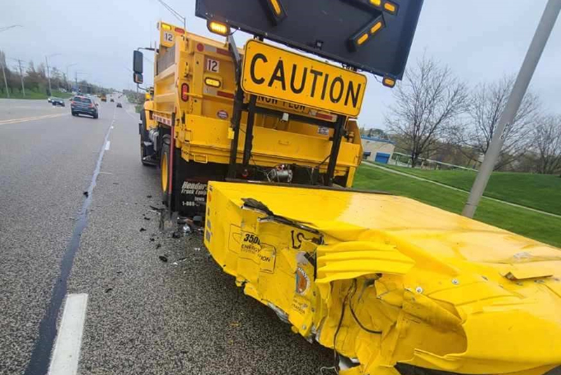 No serious injuries reported after a vehicle struck a KDOT dump truck stationed in a work zone near Randall Road