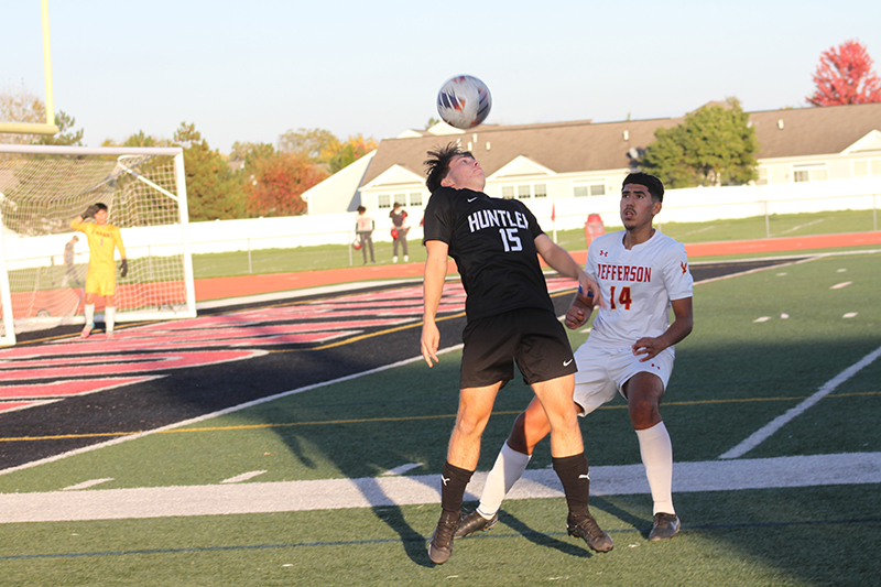 Huntley senior Tyler Roberts heads the ball during the Red Raiders regional semifinal game with Rockford Jefferson Oct. 17. Huntley won 6-0 and will host Dundee-Crown for the regional final Oct. 20.