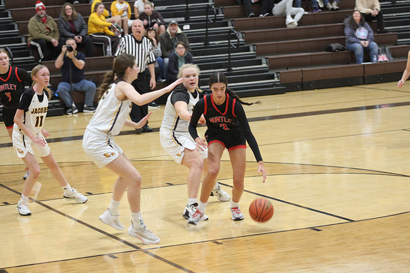 Huntley senior Cassidy Serpe drives to the basket against Jacobs.
