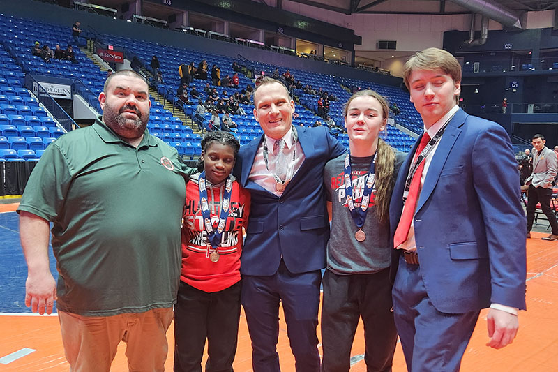 Huntley was well represented at the IHSA Girls State Wrestling meet which concluded Feb. 24. Coaches and qualifiers were, from left, boys head wrestling coach BJ Bertelsman; Janiah Slaughter, who finished second at 105 pounds; assistant coach Erik Lachel; Aubrie Rohrbacher, who finished third at 130 pounds and girls head wrestling coach Gannon Kosowski