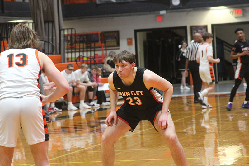 Huntley senior Ethan Blackmore plays tough defense for the Red Raiders against Crystal Lake Central.