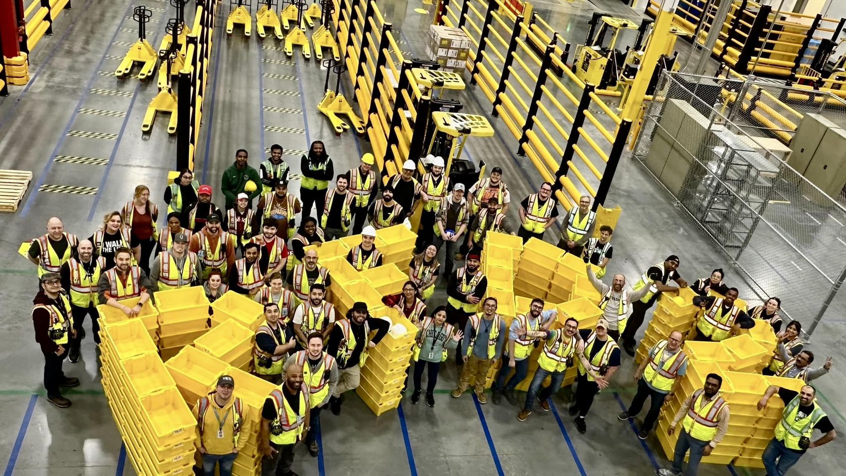 Some Amazon associates inside of Huntley's new Amazon recieve center