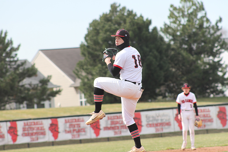 Huntley senior Malachi Paplanus fires a strike against a Hope Academy hitter.