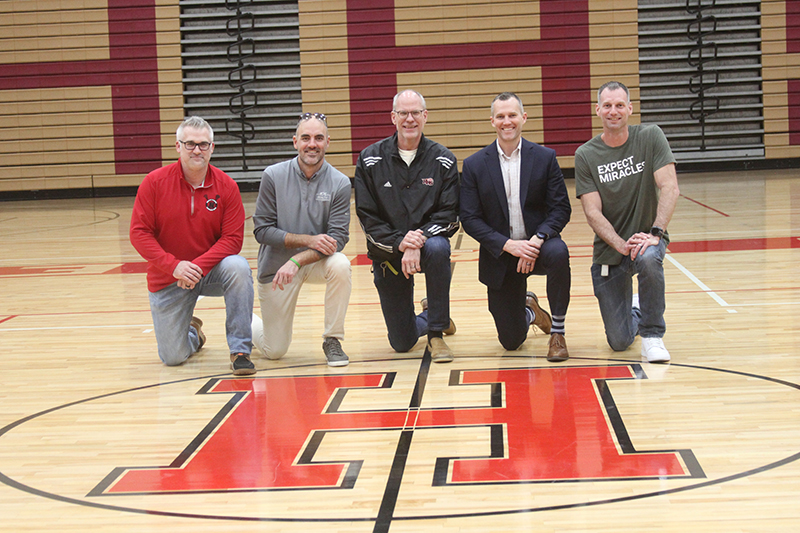 Huntley High School 2000-01 boys basketball team members shared memories of the Sweet 16 season. From left: Brett Borchart, Pat Kalamatas, head coach Jay Teagle, David Marshall and Andrew Mohney.