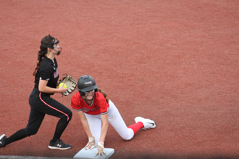 Huntley junior Ava McFadden slides into third base with a seventh-inning triple against Mundelein in the Class 4A super-sectional game. HHS fell 2-1 at Rosemont June 3.